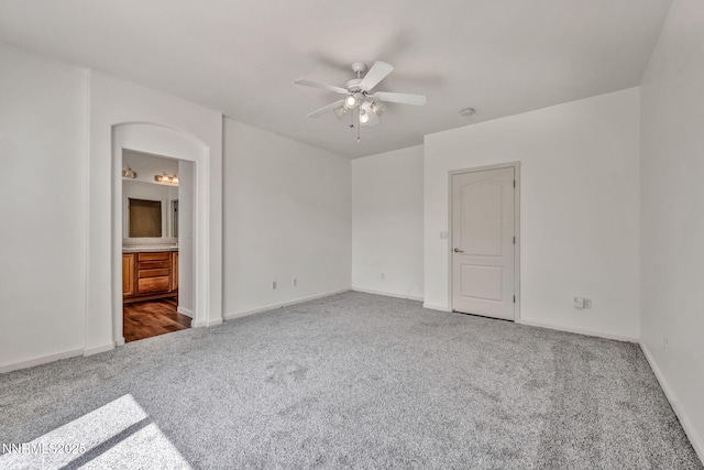 6469 Hale Bopp Ct, Sparks, NV 89436 - unfurnished bedroom with carpet flooring, connected bathroom, and a ceiling fan