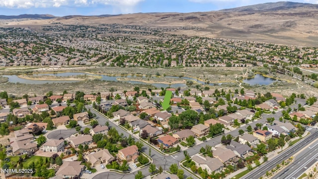 6469 Hale Bopp Ct, Sparks, NV 89436 - aerial view of property and surrounding area featuring a water and mountain view and nearby suburban area