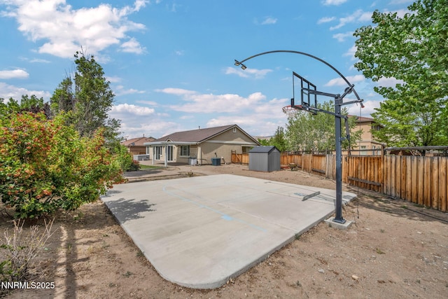 6469 Hale Bopp Ct, Sparks, NV 89436 - view of sport court featuring a storage shed, a fenced backyard, and basketball hoop