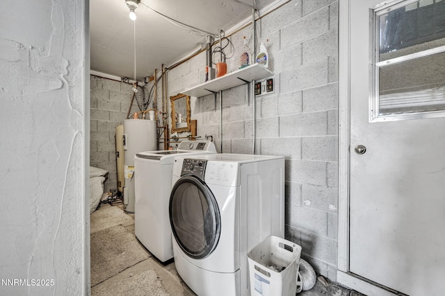 187 Jeannie Ln, Gardnerville, NV 89460 - laundry area featuring water heater and separate washer and dryer