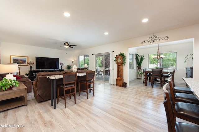 113 Denio Dr, Dayton, NV 89403 - living area with healthy amount of natural light, light wood finished floors, a chandelier, ceiling fan, and recessed lighting