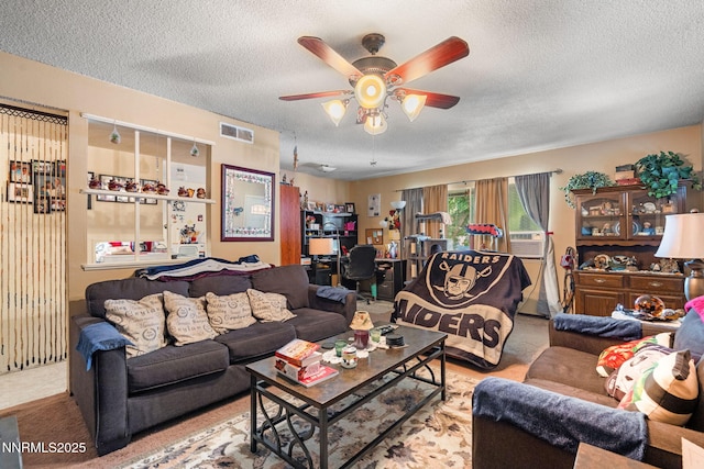 2455 Coppa Way, Sparks, NV 89431 - living area featuring a textured ceiling, a ceiling fan, cooling unit, and carpet floors