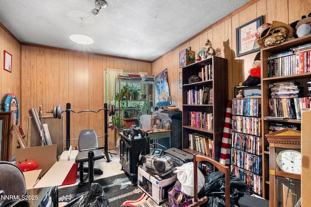 2455 Coppa Way, Sparks, NV 89431 - exercise room featuring wood walls and a textured ceiling