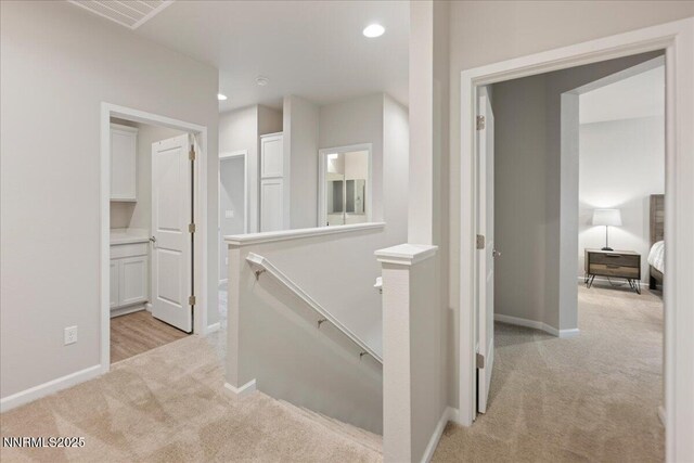 2170 Santona Cir, Reno, NV 89523 - hall featuring an upstairs landing, light carpet, and recessed lighting