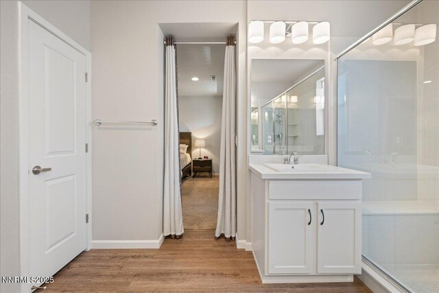 2170 Santona Cir, Reno, NV 89523 - ensuite bathroom with vanity, wood finished floors, and a shower