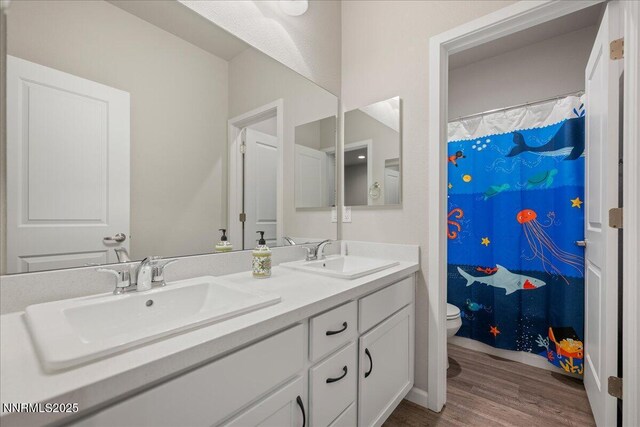 2170 Santona Cir, Reno, NV 89523 - full bathroom with double vanity and wood finished floors