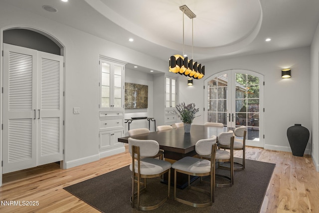 5830 Strasbourg Ct, Reno, NV 89511 - dining space featuring french doors, light wood finished floors, and recessed lighting