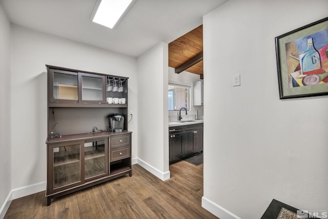 3430 Gwynelle Ct, Sparks, NV 89431 - indoor bar featuring dark wood finished floors and a wood ceiling with exposed beams