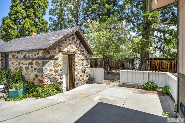 3430 Gwynelle Ct, Sparks, NV 89431 - fenced backyard with a patio area and an outdoor structure