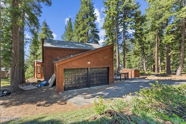 650 Tumbleweed Cir, Incline Village, NV 89451 - view of side of home featuring a garage