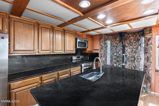 650 Tumbleweed Cir, Incline Village, NV 89451 - kitchen with appliances with stainless steel finishes, decorative backsplash, recessed lighting, a center island with sink, and coffered ceiling