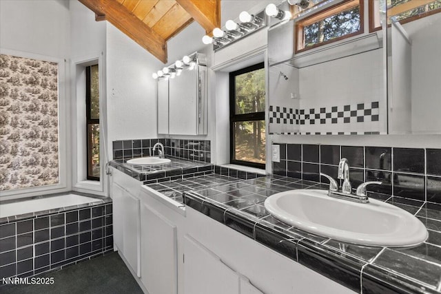 650 Tumbleweed Cir, Incline Village, NV 89451 - bathroom with double vanity, decorative backsplash, and beamed ceiling