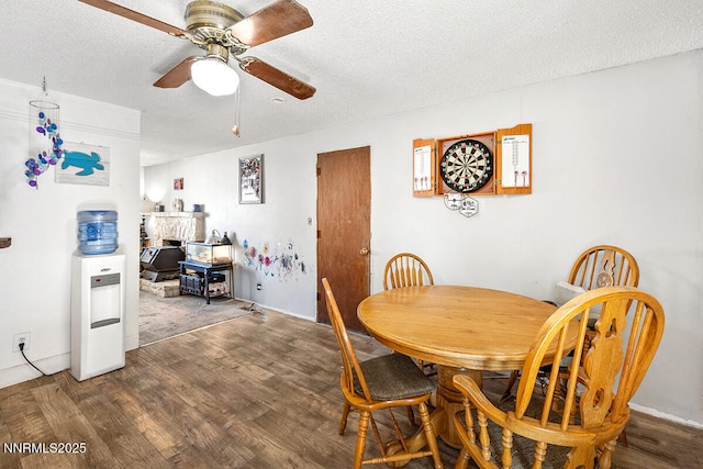 1009 E Robinson St, Carson City, NV 89701 - dining space featuring wood finished floors, ceiling fan, and a textured ceiling