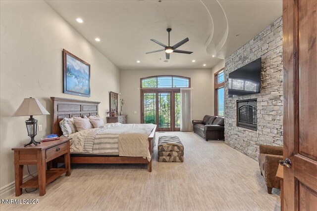 2550 Old Waverly Ct, Sparks, NV 89436 - bedroom with a fireplace, recessed lighting, and wood finished floors