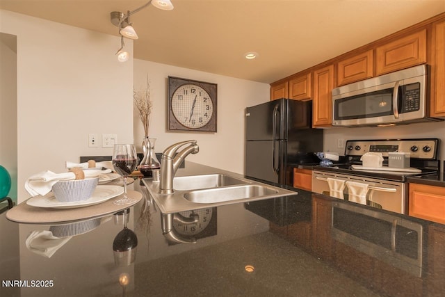 450 N Arlington Ave Unit 715, Reno, NV 89503 - kitchen featuring stainless steel appliances, brown cabinets, and recessed lighting