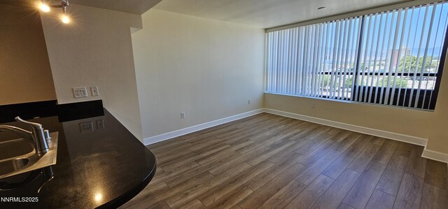 450 N Arlington Ave Unit 715, Reno, NV 89503 - unfurnished room featuring dark wood finished floors and baseboards