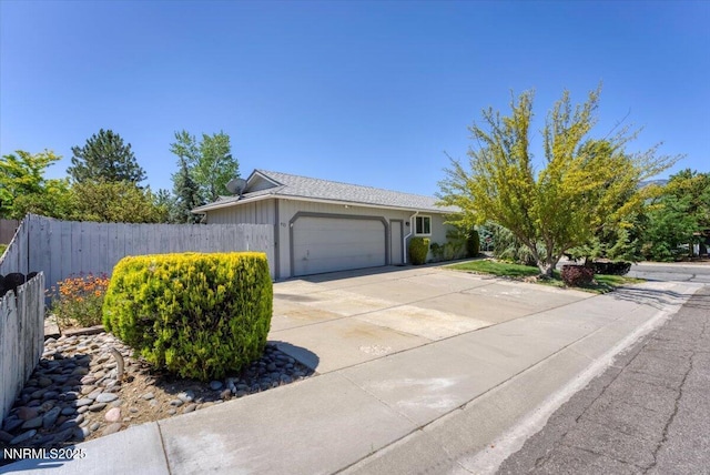 971 Shadow Ln, Carson City, NV 89705 - single story home featuring an attached garage and driveway