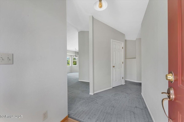 971 Shadow Ln, Carson City, NV 89705 - corridor with carpet floors and lofted ceiling