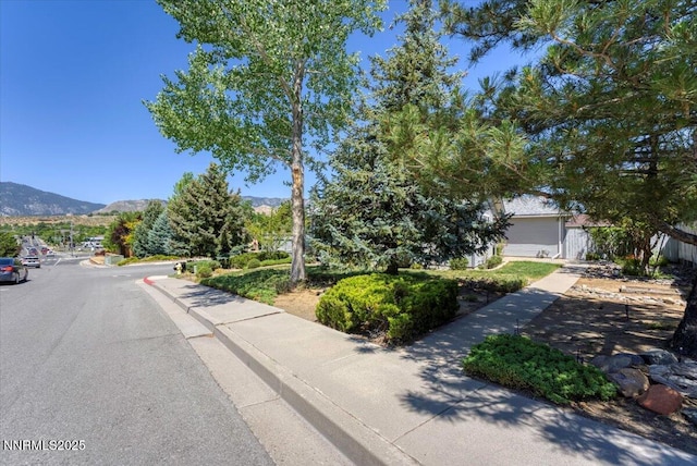 971 Shadow Ln, Carson City, NV 89705 - view of asphalt street with sidewalks and a mountain view