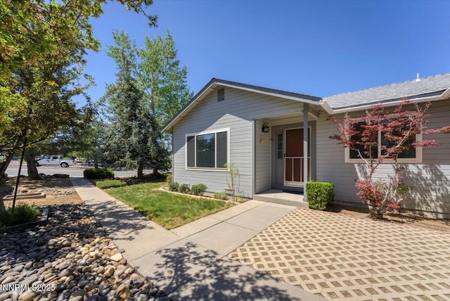 971 Shadow Ln, Carson City, NV 89705 - view of front facade featuring a front yard