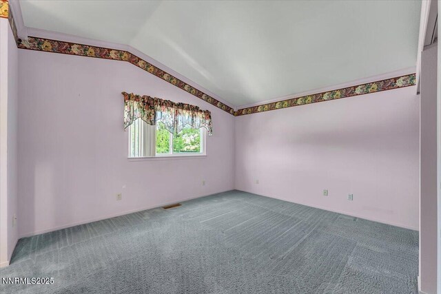 971 Shadow Ln, Carson City, NV 89705 - carpeted empty room featuring lofted ceiling