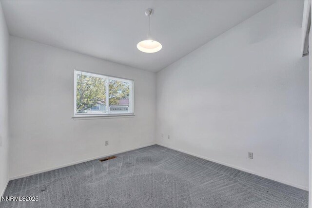 971 Shadow Ln, Carson City, NV 89705 - carpeted spare room featuring baseboards