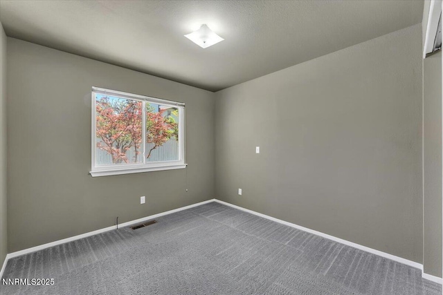 971 Shadow Ln, Carson City, NV 89705 - carpeted spare room with baseboards