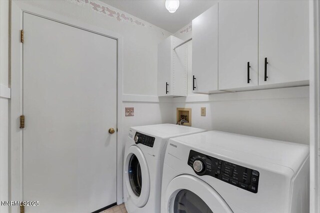 971 Shadow Ln, Carson City, NV 89705 - washroom featuring cabinet space and washer and dryer