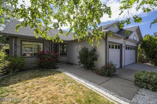 8589 Turtle Creek Ct, Reno, NV 89506 - single story home featuring an attached garage, driveway, and a front lawn