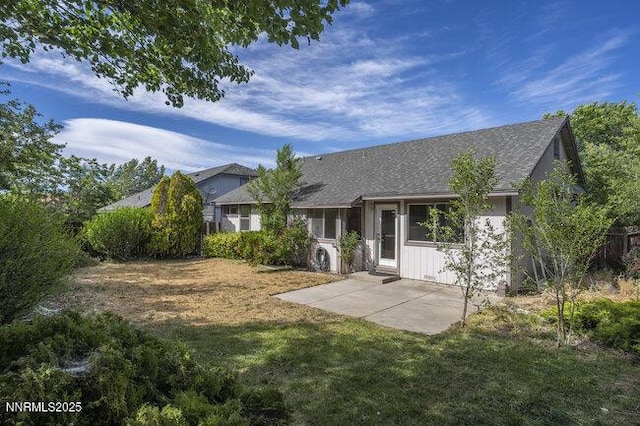 8589 Turtle Creek Ct, Reno, NV 89506 - back of property with a patio area and a yard