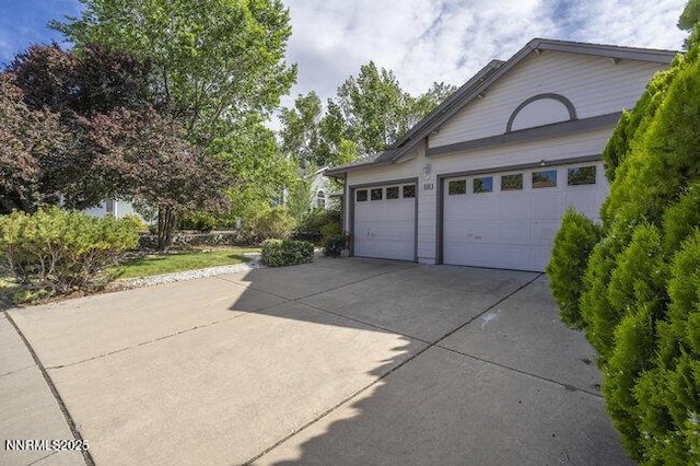 8589 Turtle Creek Ct, Reno, NV 89506 - garage with concrete driveway