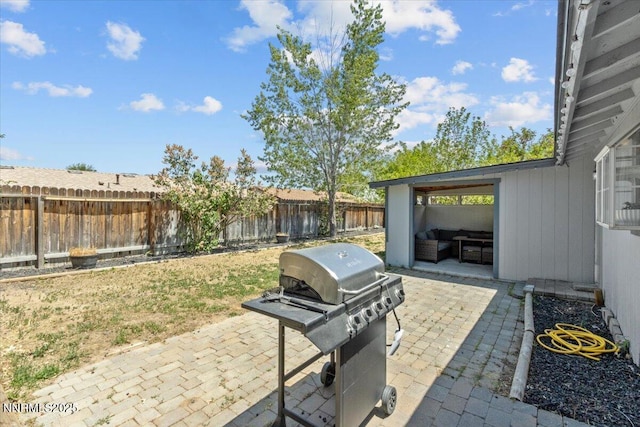 1510 E Slide Mountain Dr, Carson City, NV 89706 - fenced backyard with area for grilling, a patio area, and outdoor lounge area
