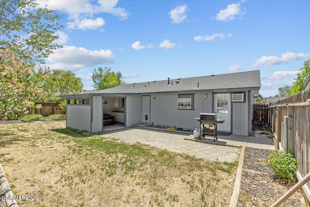 1510 E Slide Mountain Dr, Carson City, NV 89706 - rear view of house with a patio area and a fenced backyard