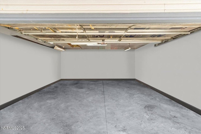 1510 E Slide Mountain Dr, Carson City, NV 89706 - garage with baseboards and a garage door opener
