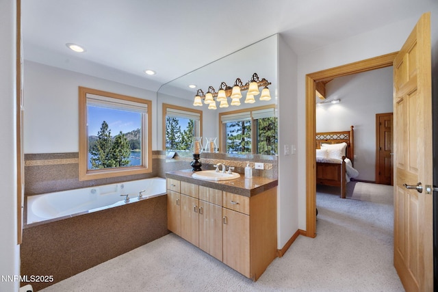 187 Yellow Jacket Rd, Glenbrook, NV 89413 - full bathroom with ensuite bathroom, vanity, recessed lighting, a garden tub, and carpet flooring