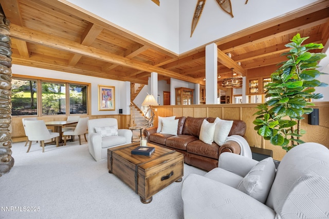 187 Yellow Jacket Rd, Glenbrook, NV 89413 - carpeted living area featuring a wooden ceiling with exposed beams, stairway, and a chandelier