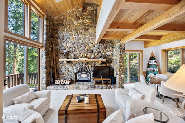 187 Yellow Jacket Rd, Glenbrook, NV 89413 - carpeted living room featuring wood ceiling, plenty of natural light, and a stone fireplace