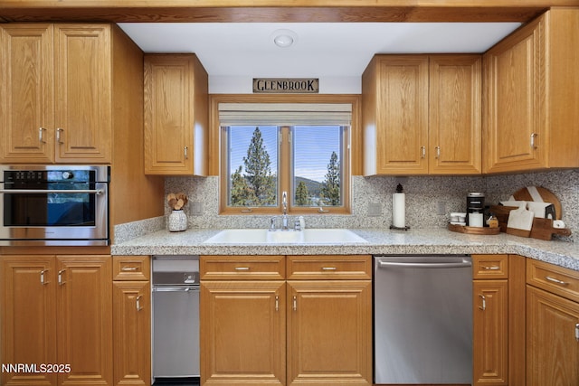 187 Yellow Jacket Rd, Glenbrook, NV 89413 - kitchen featuring appliances with stainless steel finishes, light countertops, decorative backsplash, and brown cabinetry