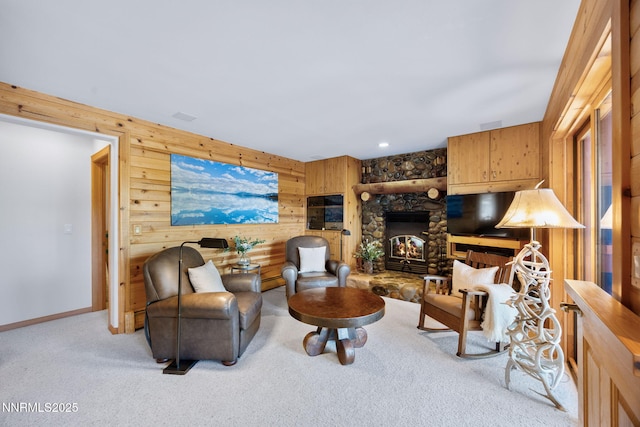 187 Yellow Jacket Rd, Glenbrook, NV 89413 - carpeted living room featuring wood walls, a baseboard radiator, and a fireplace