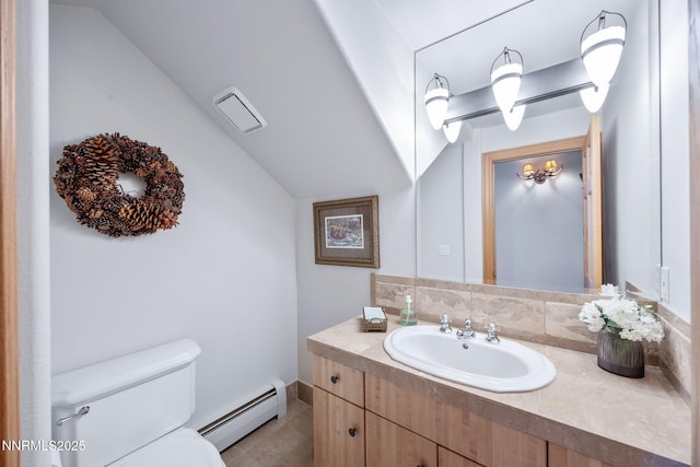 187 Yellow Jacket Rd, Glenbrook, NV 89413 - half bathroom with a baseboard radiator, lofted ceiling, and vanity