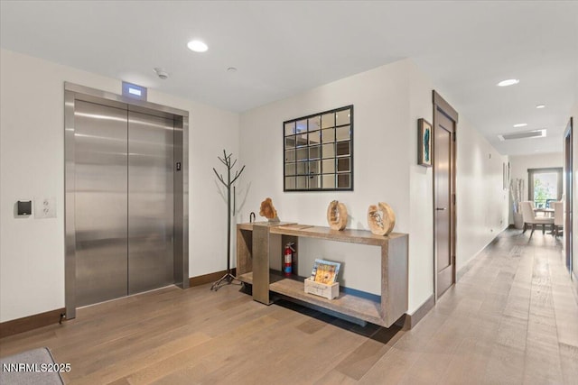 17 Beach Club Dr # 213, Stateline, NV 89449 - hallway with elevator, wood finished floors, and recessed lighting