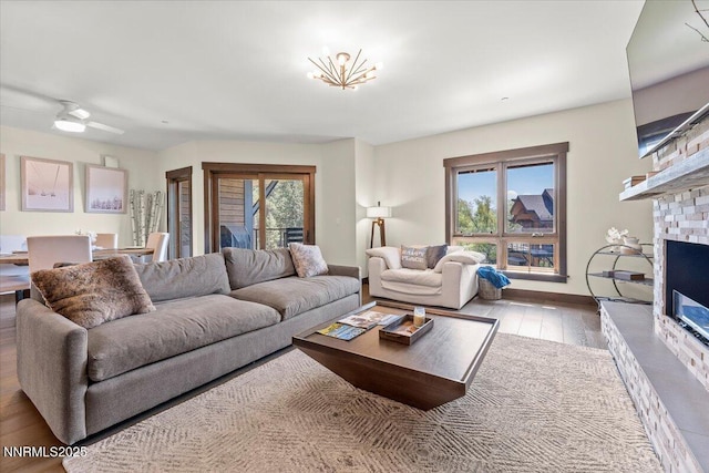 17 Beach Club Dr # 213, Stateline, NV 89449 - living area with wood finished floors, plenty of natural light, and a fireplace with raised hearth