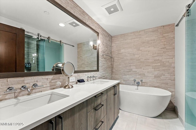 17 Beach Club Dr # 213, Stateline, NV 89449 - bathroom featuring a soaking tub, double vanity, and tile walls