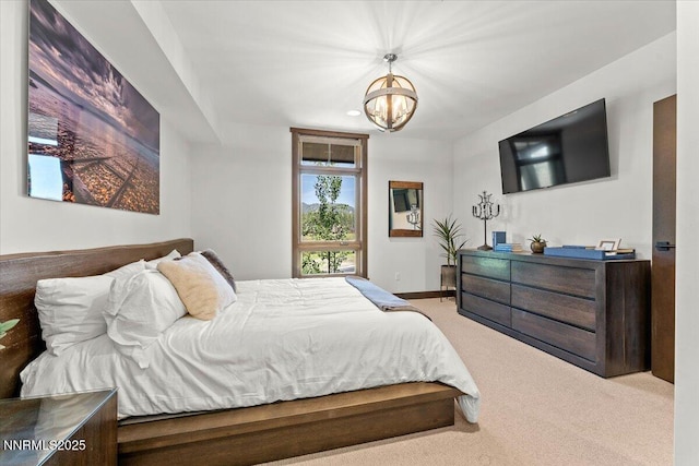17 Beach Club Dr # 213, Stateline, NV 89449 - bedroom with light carpet and a chandelier