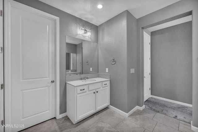 1975 Phaethon Ln, Reno, NV 89521 - bathroom with vanity, a textured wall, and tile patterned flooring