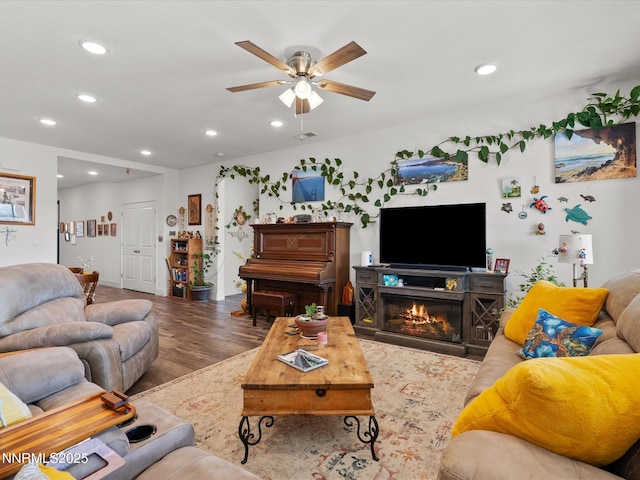 2217 Millville Dr, Spanish Springs, NV 89441 - living area with a ceiling fan, recessed lighting, wood finished floors, and a glass covered fireplace