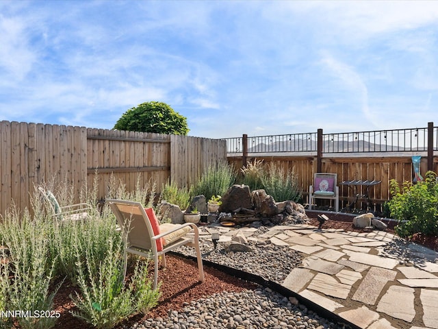 2217 Millville Dr, Spanish Springs, NV 89441 - fenced backyard with a patio