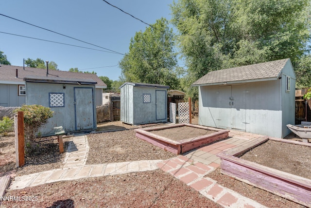 5385 Carol Dr, Sun Valley, NV 89433 - view of patio / terrace featuring a shed and a garden