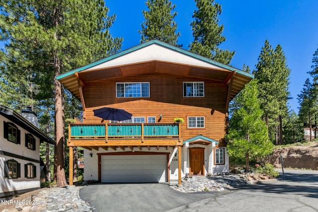 1064 Lucerne Way, Incline Village, NV 89451 - view of front of home featuring asphalt driveway and an attached garage