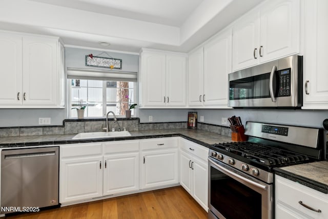 1064 Lucerne Way, Incline Village, NV 89451 - kitchen featuring stainless steel appliances, white cabinetry, and light wood-type flooring